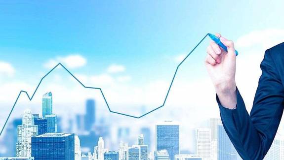 A businessman is drawing a graph